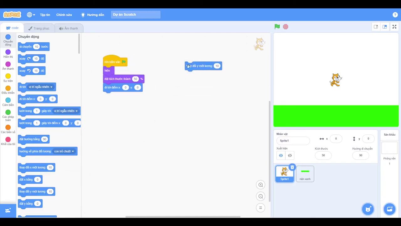Thiết lập vị trí ban đầu cho chú mèo trên nền sân khấu màu xanh.