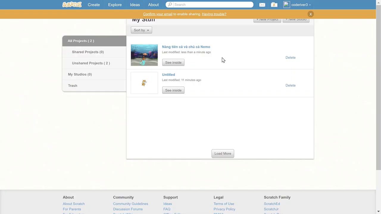 Nút Share màu cam sáng - biểu tượng của việc sẵn sàng công bố dự án Scratch của bạn với cộng đồng.